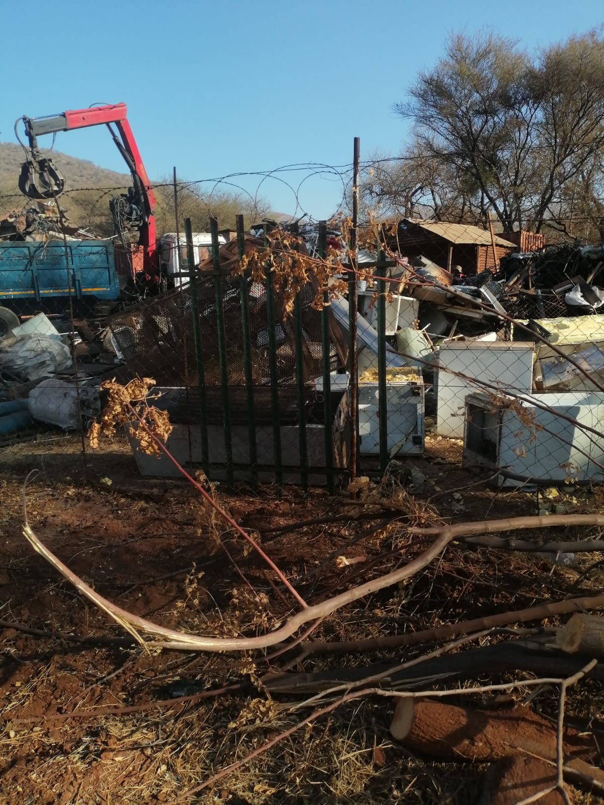 Material handling equipment at a scrap recycling yard